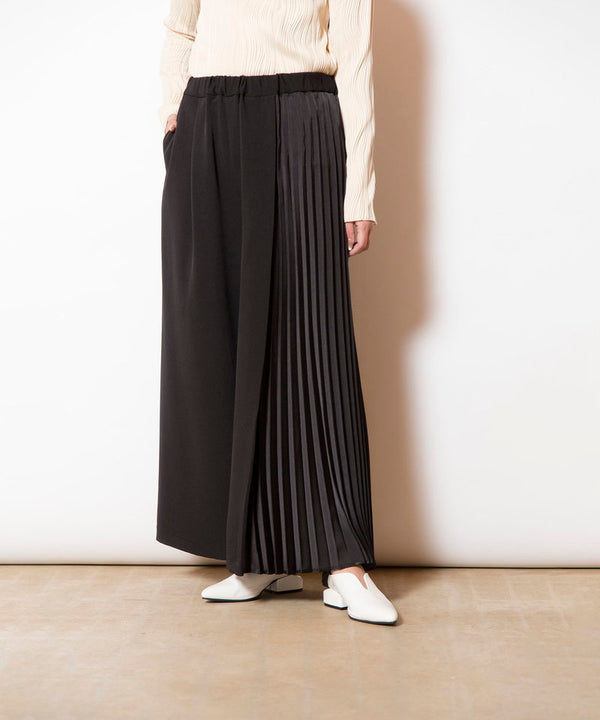 Asymmetrical pleated pants