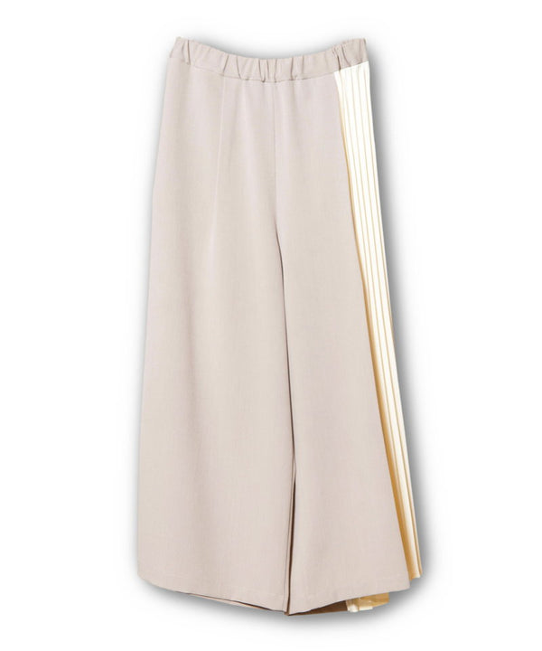 Asymmetrical pleated pants