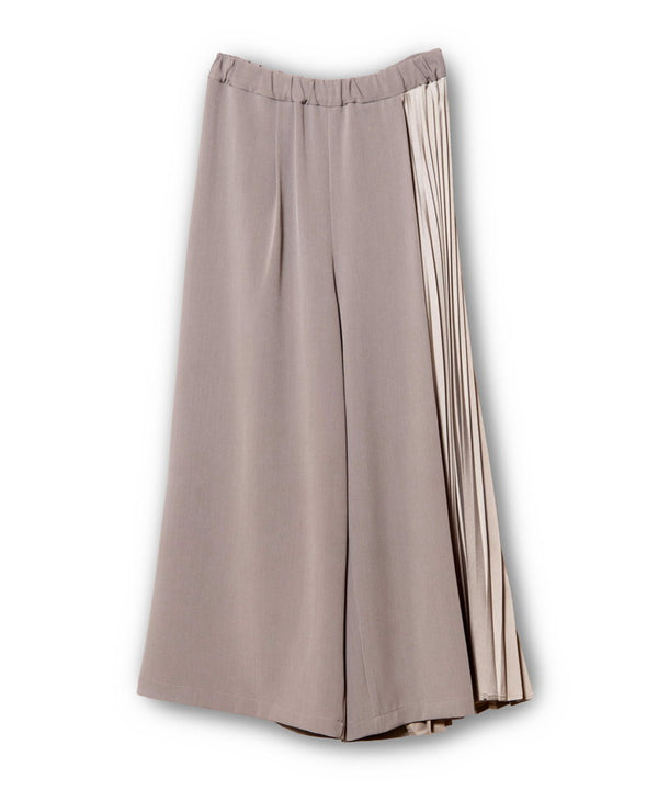 Asymmetrical pleated pants