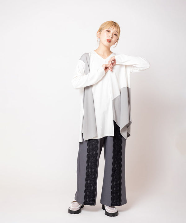 Asymmetrical switching flared pullover